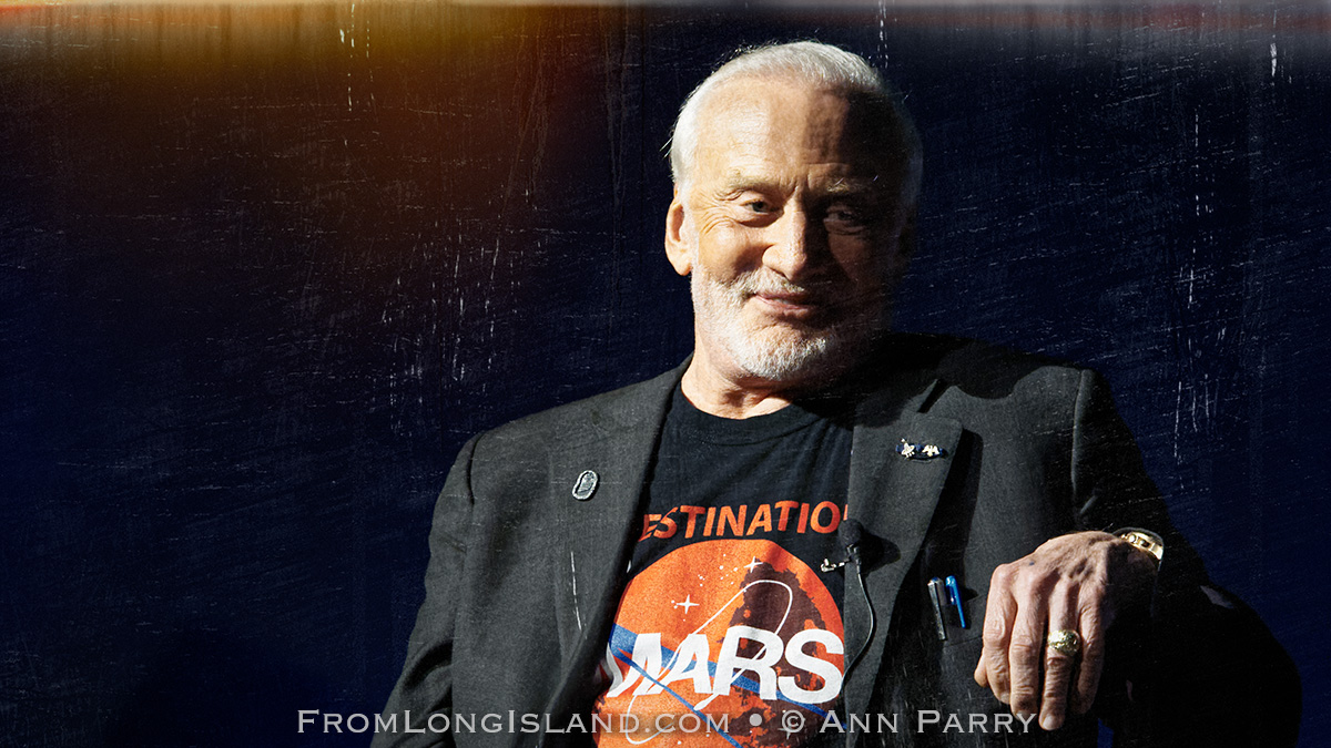 Garden City, New York, U.S. October 23, 2015. Former NASA astronaut Edwin BUZZ ALDRIN is in conversation about his experiences in space and his new Children's Middle Grade book Welcome to Mars: Making a Home on the Red Planet, at Long Island's Cradle of Aviation Museum, Aldrin signed copies of his new book. (grunge filter) © 2015 Ann Parry, Ann-Parry.com