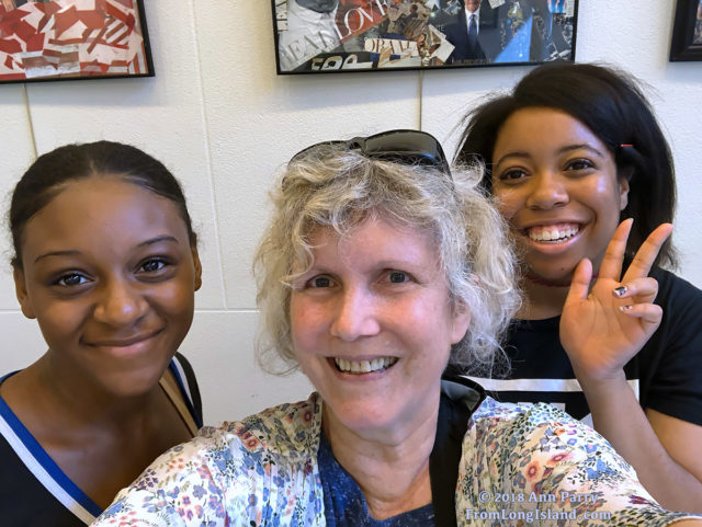 Freeport, New York, U.S. August 14, 2018. Trio with same birthday take selfie in lobby of Freeport Memorial Library, on Long Island. (2018 Ann Parry, AnnParry.com