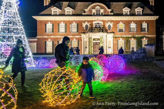 Old Westbury, New York, U.S. December 10, 2021. A light show is projected on south side of Westbury House during Shimmering Solstice, a walkthrough light show designed for historic Old Westbury Gardens. Event runs through January 9, 2022.