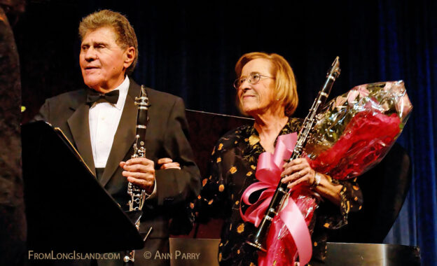 Merrick, N.Y., U.S. Nov. 13, 2010. Clarinetists Stanley Drucker and Naomic Drucker take curtain call after performing in concert presented by Merrick-Bellmore Community Concert Association. (© 2010 Ann Parry, ann-parry.com)