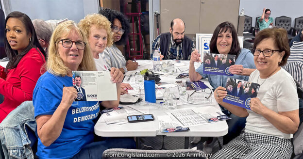 Feature Photo: Garden City, New York, U.S. May 27, 2026. The Nassau Women’s Democratic Caucus has a Postcard Party for Congressman Tom Suozzi, District 3. Volunteers shown at table include CLAUDIA BORECKY, CLAUDIA SWORSKY, LENNY GOLDSTEIN (who attended with his wife Francine Goldstein), and LORRAINE ATTIAS. © 2026 Ann Parry, annparry.com